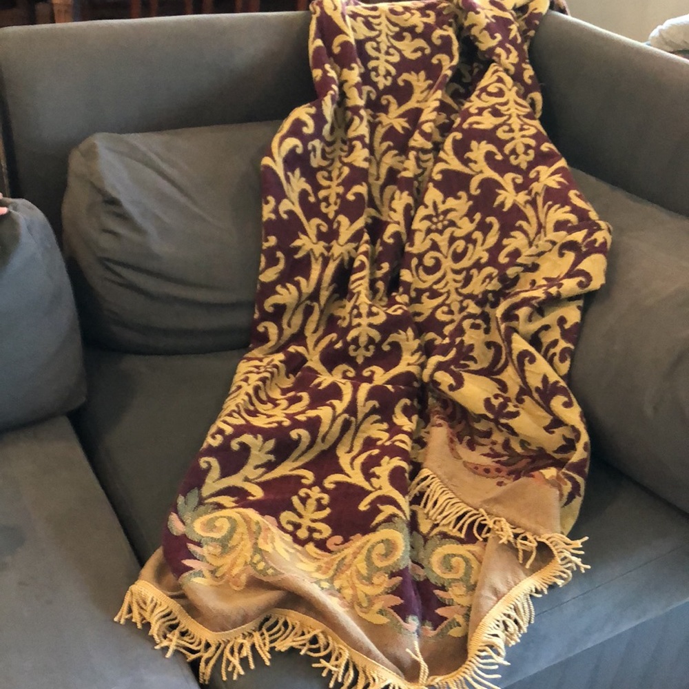 46”x75” French inspired reversible maroon & gold throw w 2” gold braided trim.